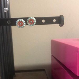 Red and blue stud earrings